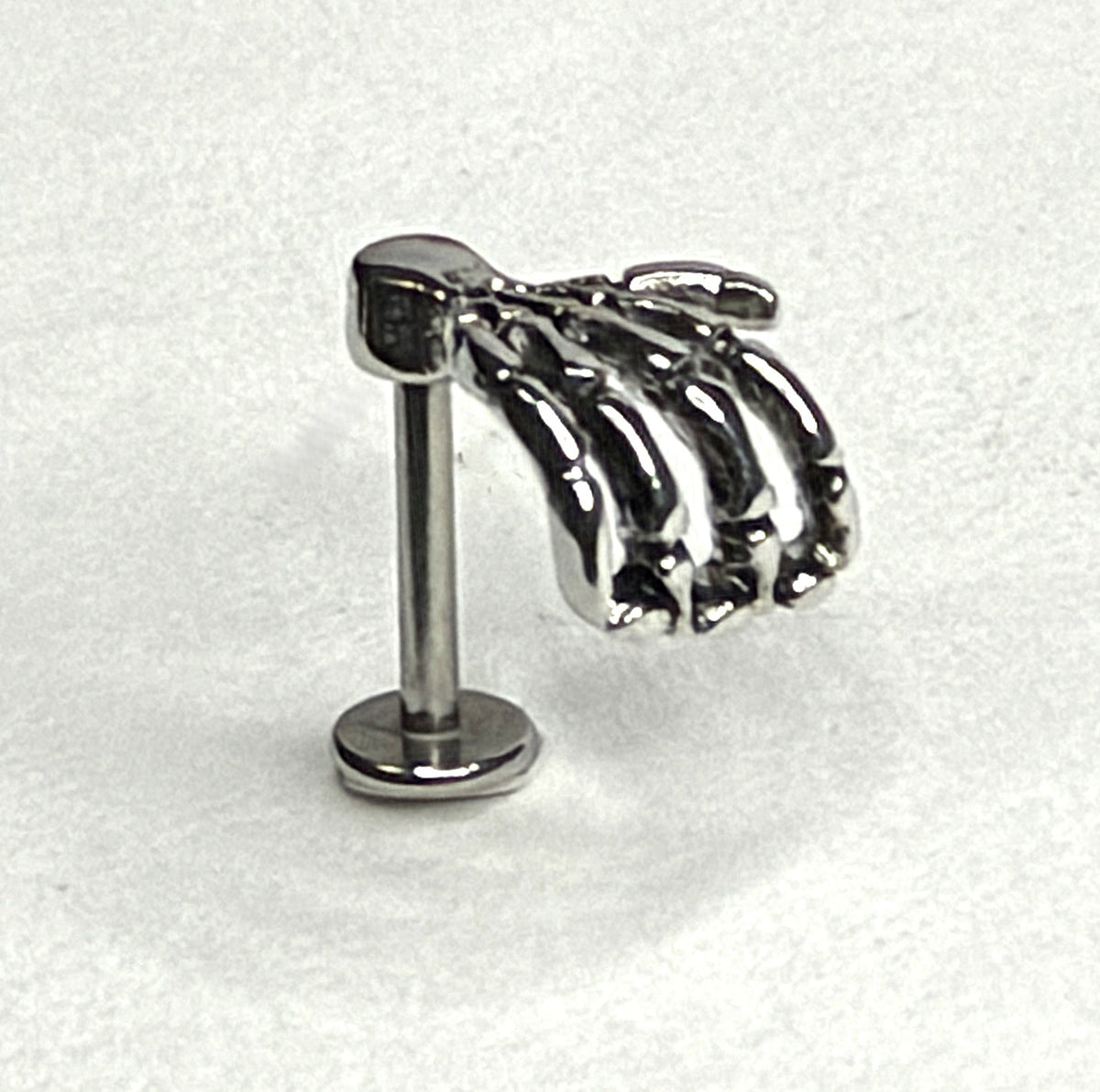 16g Steel Skeleton Hand Flat Back Stud