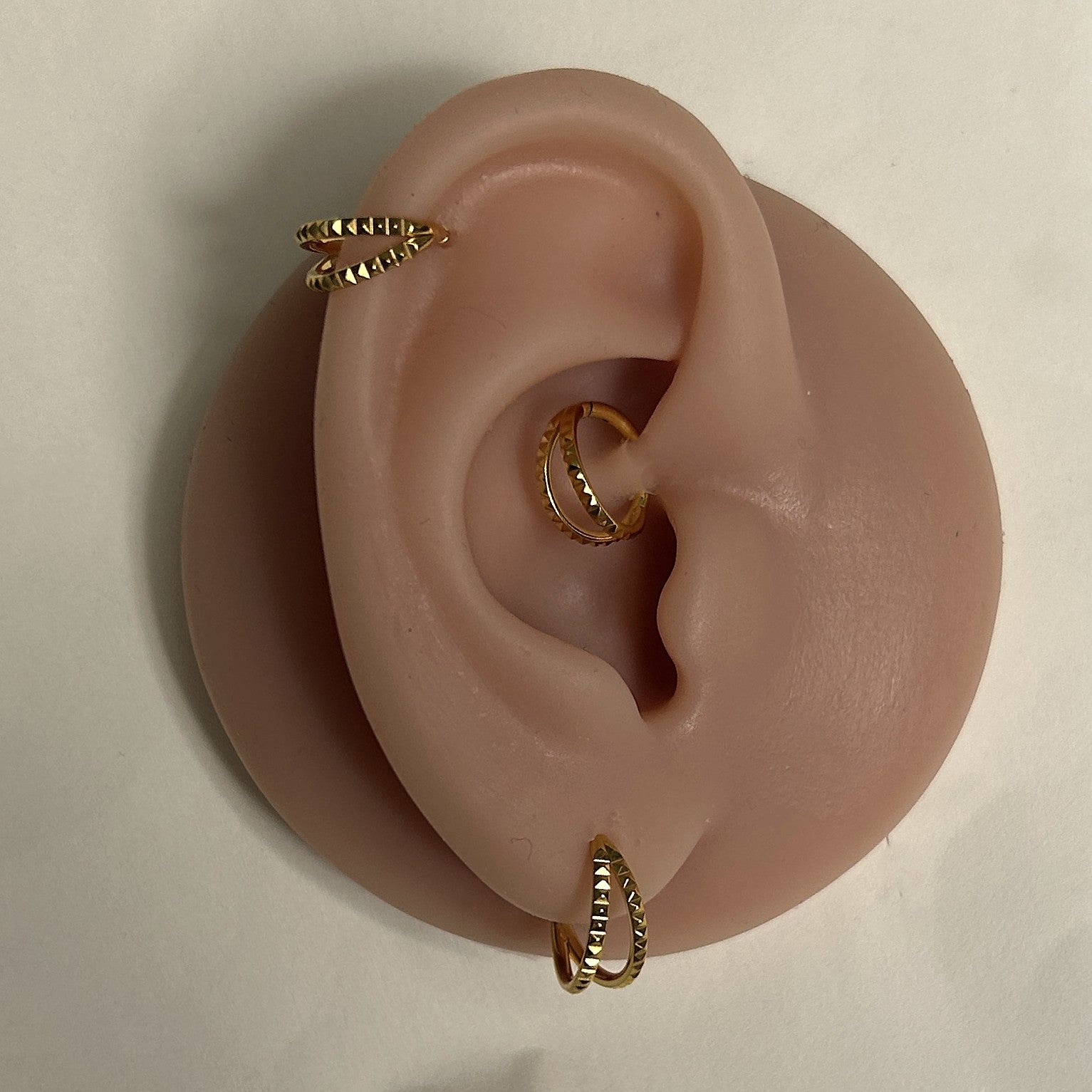 Titanium hammered double clicker hoop