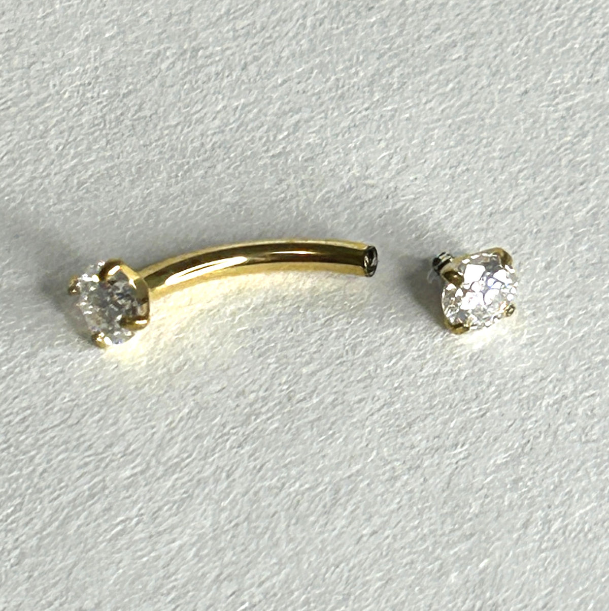 Titanium 16g Crystal Claw-Set Curved Barbell